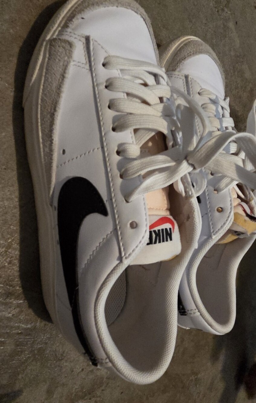 Nike White Leather Sneakers with Black Swoosh